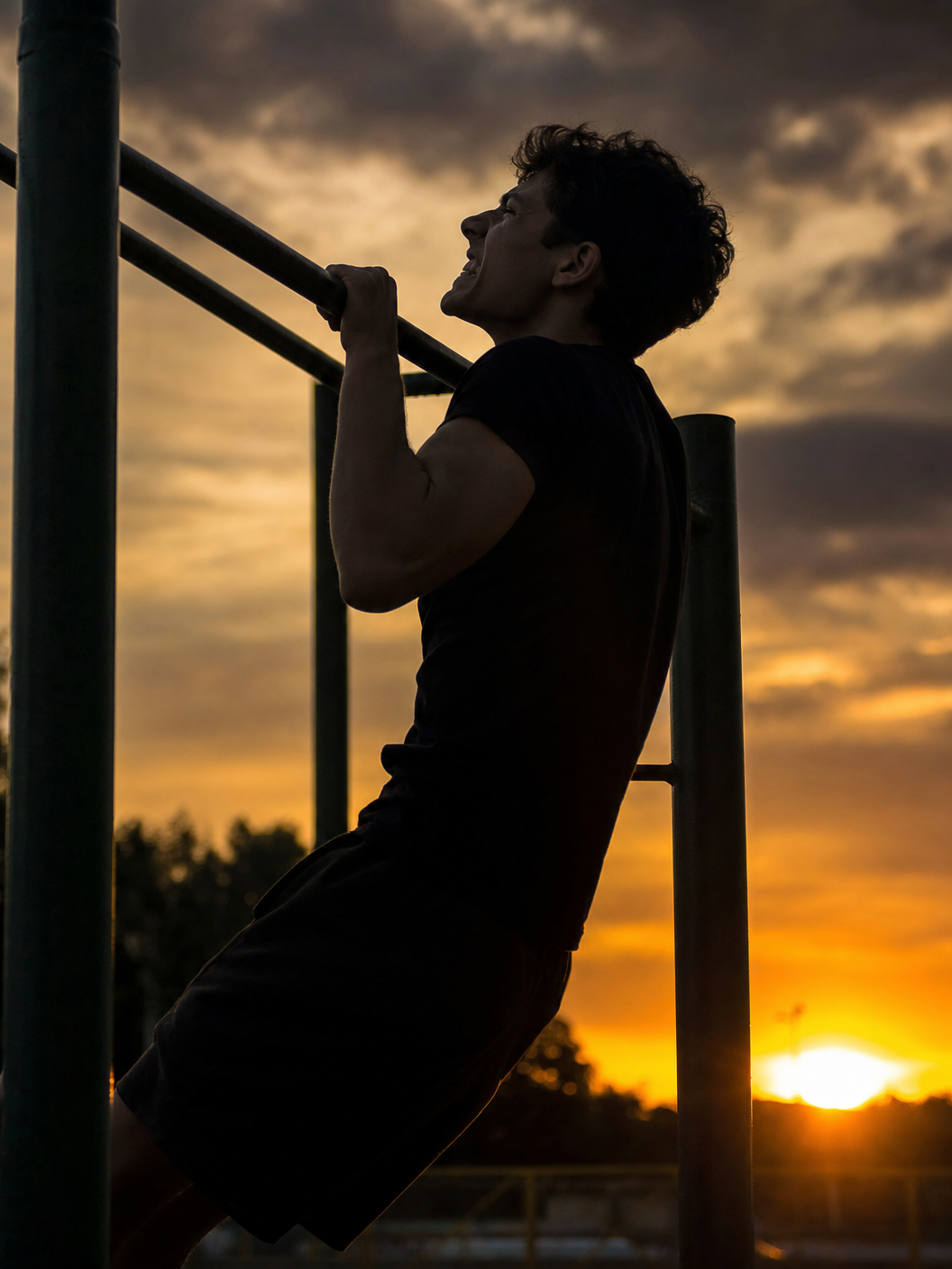 Teen doing pull-up